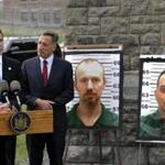 New York Governor Andrew Cuomo (left) spoke while Vermont Governor Peter Shumlin listened during a news conference in front of the Clinton Correctional Facility in Dannemora, N.Y.