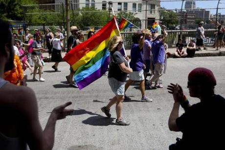 Crowds watched as participants walked through Back Bay during the annual Boston Pride parade.
