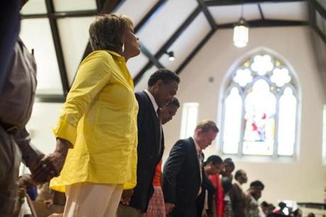 Pastor Liz Walker led parishioners in prayer during a youth-led service at Roxbury Presbyterian Church on Sunday. The sermon was on resisting getting caught up in gangs.
