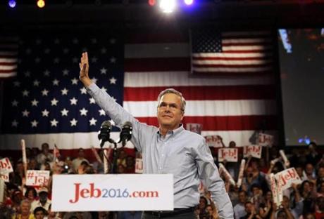 Former Florida Gov. Jeb Bush waved as he took the stage. 

