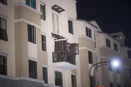 A fourth floor balcony rested on the balcony below after collapsing at the Library Gardens apartment complex in Berkeley, Calif., early Tuesday.
