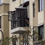 Damage was seen at the scene of an apartment building balcony collapse in Berkeley, California, on Tuesday.