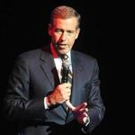 FILE - In this Nov. 5, 2014 file photo, Brian Williams speaks at the 8th Annual Stand Up For Heroes, presented by New York Comedy Festival and The Bob Woodruff Foundation in New York. Williams has admitted he spread a false story about being on a helicopter that came under enemy fire while he was reporting in Iraq in 2003. Williams said he was in a helicopter following other aircraft, one of which was hit by ground fire. His helicopter was not hit. NBC News was not commenting Thursday about whether its top on-air personality would face disciplinary action. (Photo by Brad Barket/Invision/AP, File)