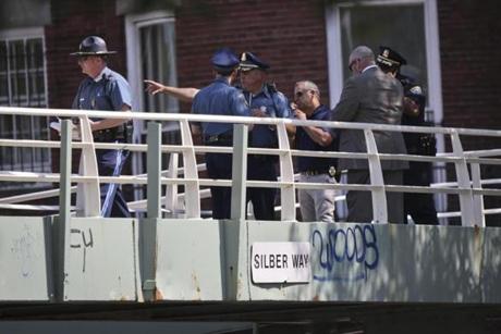 Officers were on the scene of the shooting on a footbridge over Storrow Drive.
