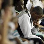 Parishioners prayed at Emanuel African Methodist Episcopal Church in Charleston, S.C. Sunday morning.