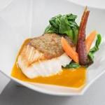 Cod loin, lightly cured in a spice rub, is served crisp-skinned in a curry broth with bok choy.