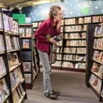 Jane Yudelman of Somerville, browsed the DVD collection at Hollywood Express, the last video store in Cambridge. The store is set to close at the end of the month.  