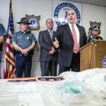 Massachusetts State Police  Colonel Timothy Alben  spoke at a briefing at MSP Troop A Headquarters in Danvers on the seizure of drugs, guns, and cash from a heroin and Fentanyl operation. 