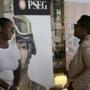 Sophia Lewis (left) of PSEG Long Island spoke with a visitor at a job fair in New York this week.
