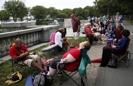 People waited in line to stake their claim on the Esplanade early Saturday.
