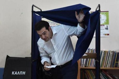 Greek Prime Minister Alexis Tsipras exited a polling booth during the Greek referendum in Athens on July 5. 
