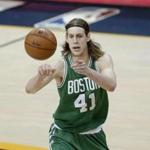 Boston Celtics? Kelly Olynyk passes against the Cleveland Cavaliers during a first-round NBA playoff basketball game Tuesday, April 21, 2015, in Cleveland. (AP Photo/Tony Dejak)