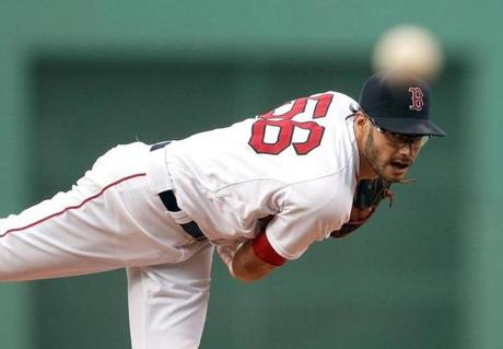 BOSTON, MA - JUNE 23: Joe Kelly #56 of the Boston Red Sox throws in the first inning against the aka at Fenway Park on June 23, 2015 in Boston, Massachusetts. (Photo by Jim Rogash/Getty Images)
