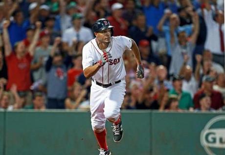 07/07/15: Boston, MA: The Red Sox Xander Bogaerts brings the crowd out of their seats as he rips a three run single in the bottom of the 7th inning to give Boston a 4-3 lead. The Boston Red Sox hosted the Miami Marlins in an inter league MLB baseball game at Fenway Park. (Globe Staff Photo/Jim Davis) section:sports topic:Red Sox-Marlins (1)
