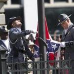 The flag was lowered by an honor guard of South Carolina troopers during a 6-minute ceremony.