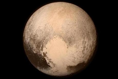 NASA released a close-up photo of Pluto early Tuesday morning.
