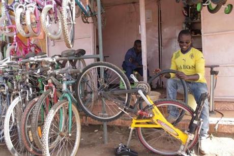 A bike being repaired outside Cycloville in Kenya, which will be getting a shipment from Boston-based non-profit Bikes Not Bombs.
