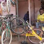 A bike being repaired outside Cycloville in Kenya, which will be getting a shipment from Boston-based non-profit Bikes Not Bombs.