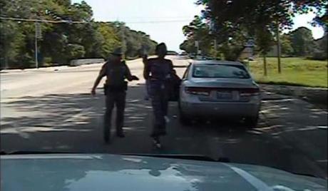 Texas state trooper Brian Encinia points a taser as he orders Sandra Bland out of her vehicle.
