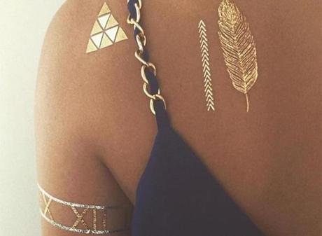 Degelis Tufts, a Nahant native, has started a company that offers temporary metallic tattoos called TribeTats.
