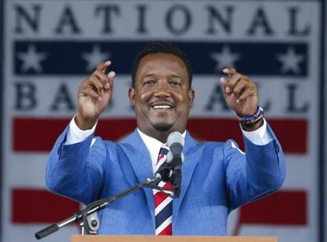 National Baseball Hall of Fame inductee Pedro Martinez speaks during an induction ceremony at the Clark Sports Center on Sunday, July 26, 2015, in Cooperstown, N.Y. (AP Photo/Mike Groll) 

