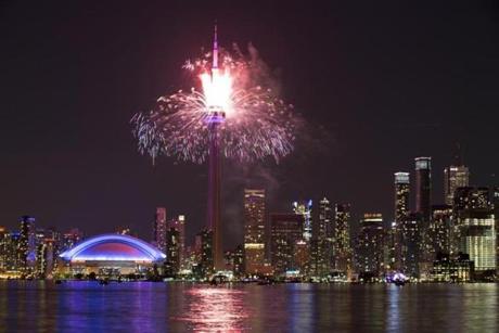 Fireworks exploded from the CN Tower over downtown Toronto during the closing ceremonies of the Pan Am Games Sunday.
