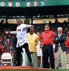 07/28/15: Boston, MA: The Red Sox held a ceremony to retire the #45 of recent Hall of Fame inductee Pedro Martinez before their game vs. the Chicago White Sox at Fenway Park. With fellow Hall of Famers Jim Rice, Carlton Fisk and Carl Yastrzemski looking on, he fires the ceremonial first pitch. (Globe Staff Photo/Jim Davis) section:sports topic:Red Sox-White Sox (1)
