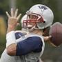 New England Patriots quarterback Tom Brady (12) throws a pass during an NFL football minicamp Tuesday, June 16, 2015, in Foxborough, Mass. (AP Photo/Stephan Savoia)