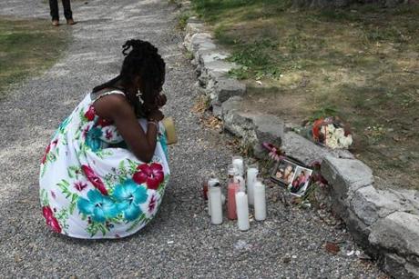 Tanya Hall, a longtime friend and neighbor of Grisel Sanchez, paused at a memorial Wednesday where she was killed.
