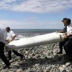 Officers on the island of Réunion carried an object that appeared to be a wing flap from a jetliner Wednesday. US investigators say the object came from a Boeing 777, and the only such plane missing is Malaysia Airlines Flight 370.