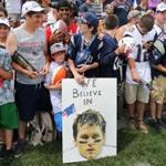 Foxboro--07/30/15 The New England Patriots held their first day of training camp at the practice filed next to Gillette Stadium. Fans with a Brady sign wait for autographs. Globe staff photo by John Tlumacki(sports)