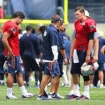 Foxboro--07/30/15 The New England Patriots held their first day of training camp at the practice filed next to Gillette Stadium. Jimmy Garopplo and Tom Brady chat with their coach at the end of practice. Globe staff photo by John Tlumacki(sports)