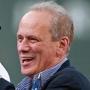 Red Sox president and chief executive Larry Lucchino greeted David Ortiz at the Pedro Martinez jersey retirement ceremony last week. Lucchino said Saturday that he?ll retire from those posts at season?s end.