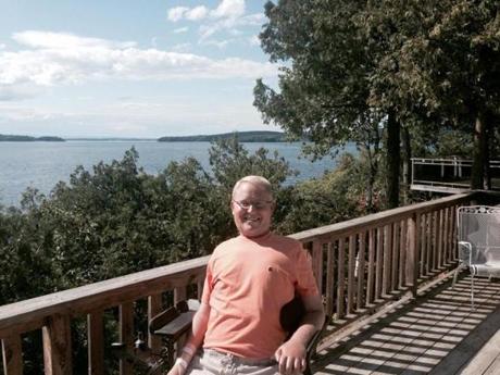 Travis Roy counts being on this deck overlooking Malletts Bay as one of his joys.
