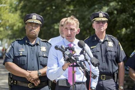 Boston Police Commissioner William Evans made a statement near the scene of a shooting.
