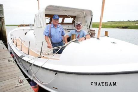  Boat volunteers Richard Ryder (left) and Don St. Pierre.

