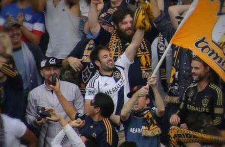 Fans react during an LA Galaxy-New England Revolution match. 
