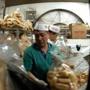 Workers bagged rolls at Quinzani's Bakery on Harrison Avenue in 2003.