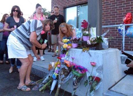 On Sunday, people placed flowers at the site where Vermont social worker Lara Sobel was killed on Friday in Barre, Vt. 
