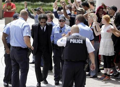 Cornel West was arrested by St. Louis Police during a protest outside the Thomas F. Eagleton Federal Courthouse.
