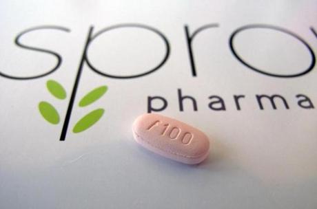 A tablet of flibanserin is seen on a brochure for Sprout Pharmaceuticals at the company's Raleigh, N.C., headquarters.
