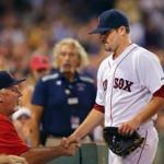 Wade Miley received a hand from pitching coach Carl Willis after he exited in the eighth inning. 