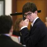 Former St. Paul's student Owen Labrie confers with his lawyer before the start of the second day of his trial at Merrimack County Superior Court in Concord, N.H., Wednesday, Aug. 19, 2015. Labrie is accused of raping a 15-year-old freshman as part of the 