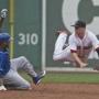 Alcides Escobar stole second base and advanced to third on a throwing error from Ryan Hanigan as second baseman Josh Rutledge tried to make the play in the seventh inning.
