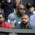 Canadian performer Drake, right, watched the women's singles semifinal match between Serena Williams of the United States and Maria Sharapova of Russia at the All England Lawn Tennis Championships.
