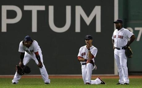 The Red Sox would have a young, exciting outfield if they can get Hanley Ramirez (left) out of left field and keep Rusney Castillo alongside Mookie Betts (middle) and Jackie Bradley Jr. (right).
