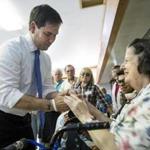 Marco Rubio spoke to Marie Kenneally during a town hall meeting in Littleton, N.H., on Wednesday. 