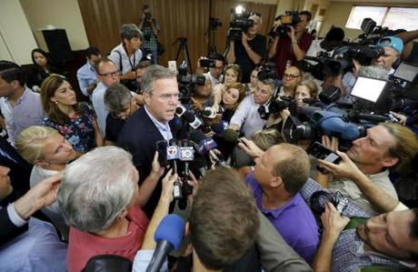 Jeb Bush spoke to reporters following a event with high school students in Miami, Fla., on Tuesday.
