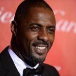 He looks good in a tux, but the new James Bond author says Idris Elba is too ?street? to play James Bond.