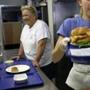 Labor Day weekend may be the busiest stretch of summer at the Clam Box, where owner Chickie Aggelakis (left) supervised as Mackenzie Colbert served.